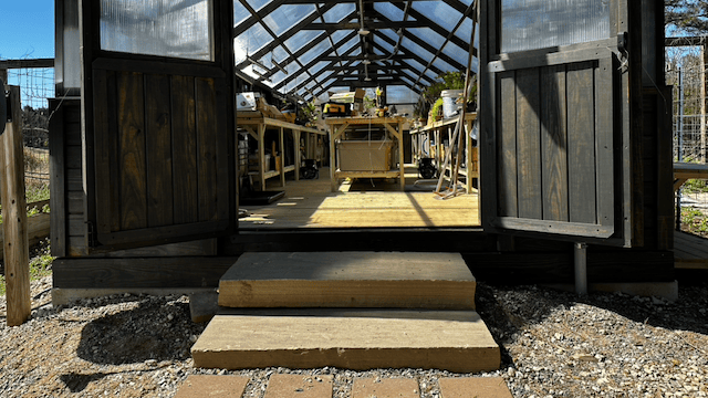 New stone stairs leading to the greenhouse